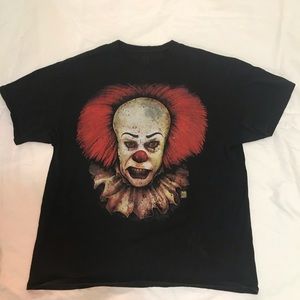 It is a black shirt with pennywise the clown.